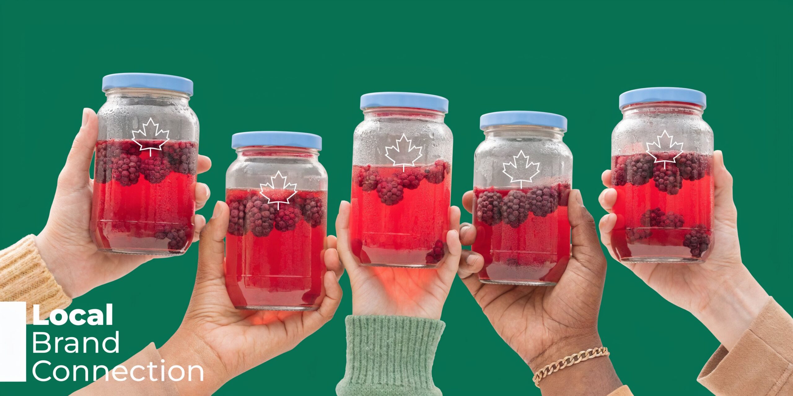 Several diverse hands holding glass jars filled with red berry juice against a solid green background.