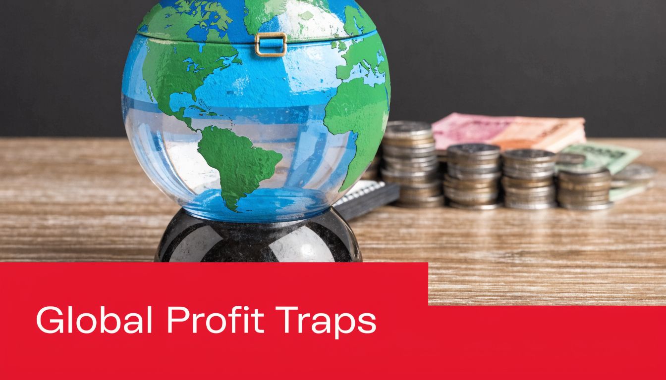 A globe atop a wooden table with stacks of coins and paper currency, representing global financial traps.