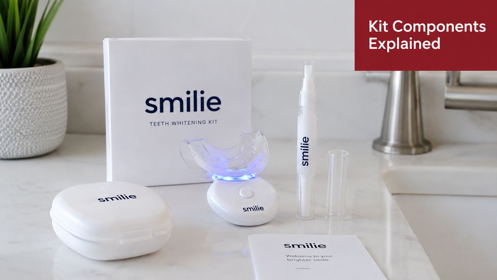 A Smilie teeth whitening kit featuring the box, light-up mouth tray, whitening pen, case, and instructions.